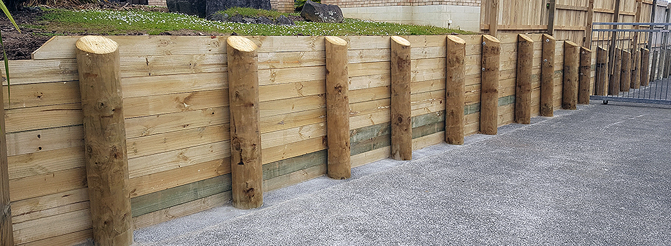 Timber retaining wall replaced alongside existing driveway Timber retaining wall replaced alongside existing driveway in Auckland